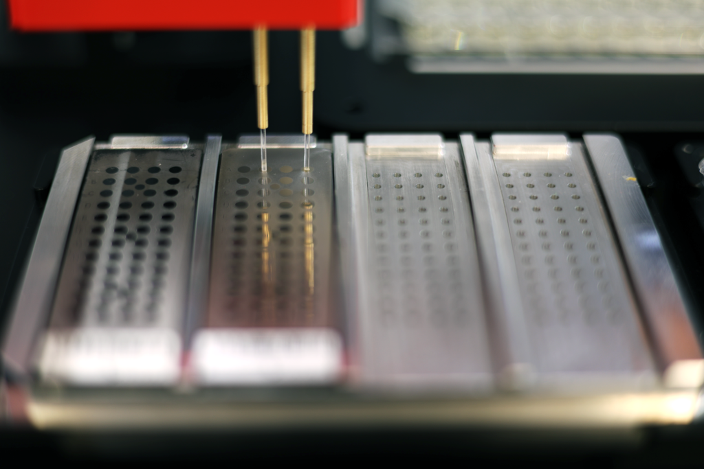 Image of PIXL Max using two pinning heads to load a MALDI-TOF plate
